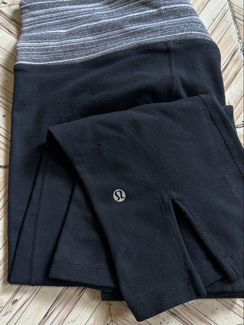 Lululemon Black Crop Pants Size 4 (Category: Activewear) located in Manila. Submitted by alejeong27 (Listing ID 1460094534, Image 3). Description: - Black Lululemon crop pants - Size 4 - Fold-over waistband with grey and white stripes - Small Lululemon logo on left leg - Slit detail at the hem - Comfortable for workouts or casual wear.
