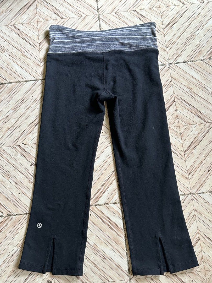 Lululemon Black Crop Pants Size 4 (Category: Activewear) located in Manila. Submitted by alejeong27 (Listing ID 1460094534, Image 1). Description: - Black Lululemon crop pants - Size 4 - Fold-over waistband with grey and white stripes - Small Lululemon logo on left leg - Slit detail at the hem - Comfortable for workouts or casual wear.