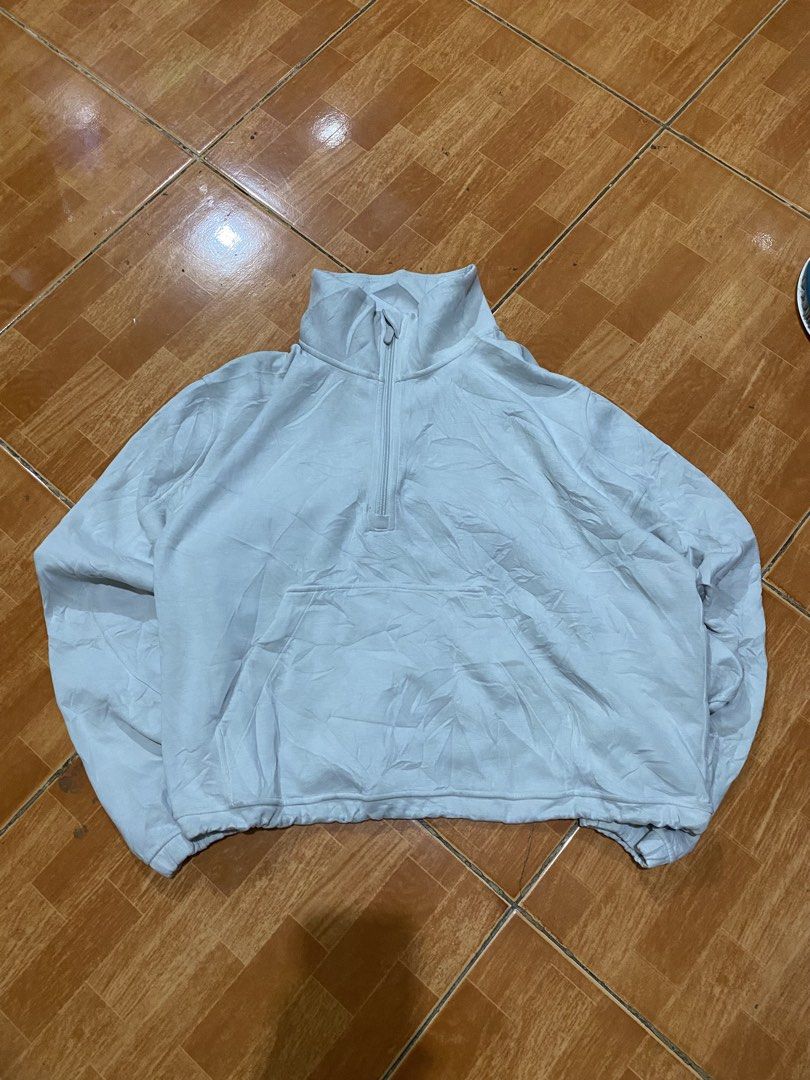 Lululemon Grey Quarter Zip Pullover Sweater Size 12 (Category: Coats, Jackets and Outerwear) located in Manila. Submitted by jairusdave65695 (Listing ID 1460059711, Image 1). Description: - Grey Lululemon quarter zip pullover - Size: 12 - Features a kangaroo pocket - High neck design - Material: Recycled polyester, modal, elastane - Ideal for workouts and casual wear.