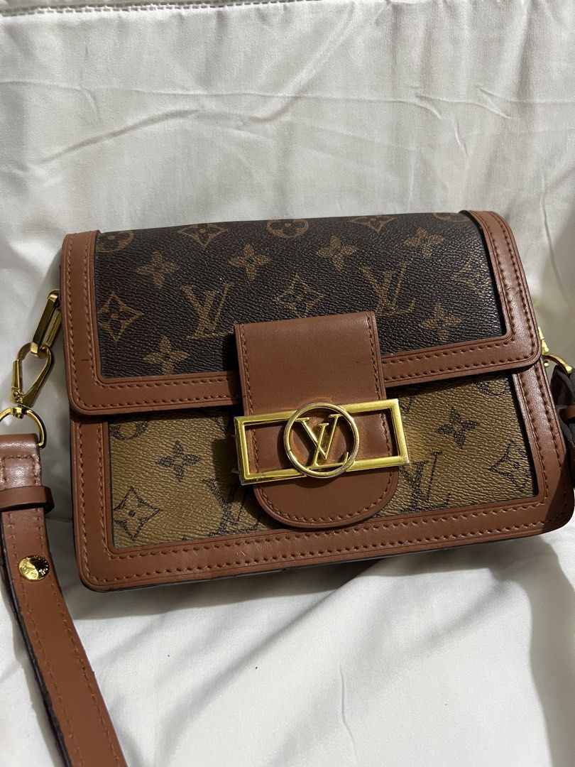 LV Mini Dauphine Monogram Leather Shoulder Bag (Category: Luxury Bags & Wallets) located in Pasig City. Submitted by madiesbags (Listing ID 1460093759, Image 1). Description: - Authentic Louis Vuitton Monogram Shoulder Bag - Classic Monogram Canvas with Brown Leather Trim - Elegant Gold Hardware Details - Made in France - Interior Zipper Pocket for Secure Storage - Adjustable Strap for Comfortable Wear - Ideal for Daily Use.
