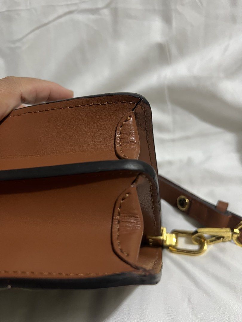 LV Mini Dauphine Monogram Leather Shoulder Bag (Category: Luxury Bags & Wallets) located in Pasig City. Submitted by madiesbags (Listing ID 1460093759, Image 3). Description: - Authentic Louis Vuitton Monogram Shoulder Bag - Classic Monogram Canvas with Brown Leather Trim - Elegant Gold Hardware Details - Made in France - Interior Zipper Pocket for Secure Storage - Adjustable Strap for Comfortable Wear - Ideal for Daily Use.