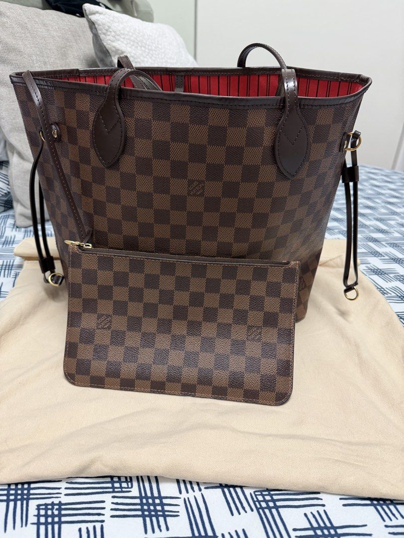 LV Neverfull MM NM D. EBE. (Category: Luxury Bags & Wallets) located in Pasig City. Submitted by joy_b_ (Listing ID 1459973759, Image 3). Description: For Sale: LV Neverfull MM NM D. EBE Rank: SA good as nee Price: 100K PHP slightly negotiable Bag: Interior is clean, exterior is clean. Inclusions: Paperbag, Box, Receipt and Dustbag Payment: Strictly Bank Transfer only For sure buyers, you may send me a message if you want to see the bag in person