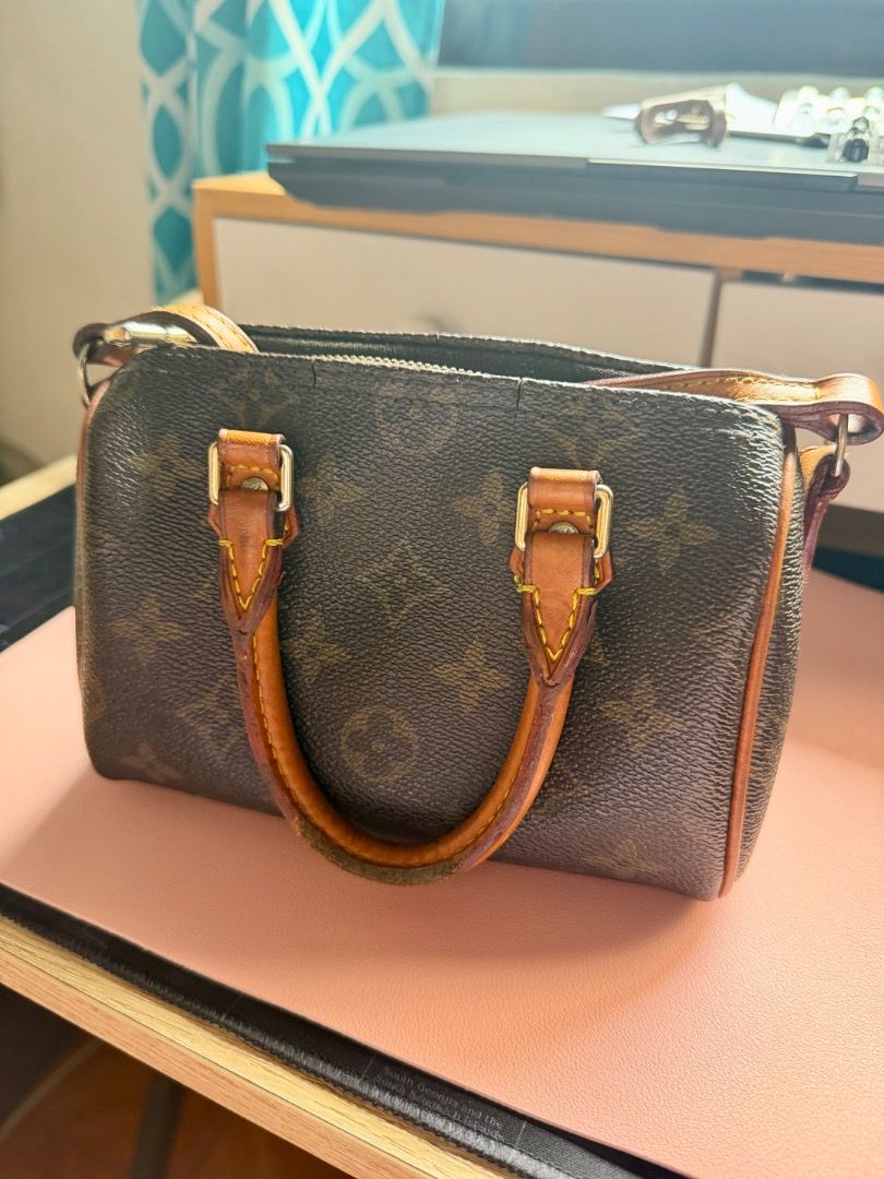 LV Speedy Nano 🤎 (Category: Luxury Bags & Wallets) located in Paniqui. Submitted by kinz.0 (Listing ID 1459939135, Image 2). Description: LV Speedy Nano👜 -Tiny but has big personality -Can be paired with many outfitssssss -Cute but can surprisingly fit many things -Not brand new -Usual wear and tear -Coded but not guaranteed .