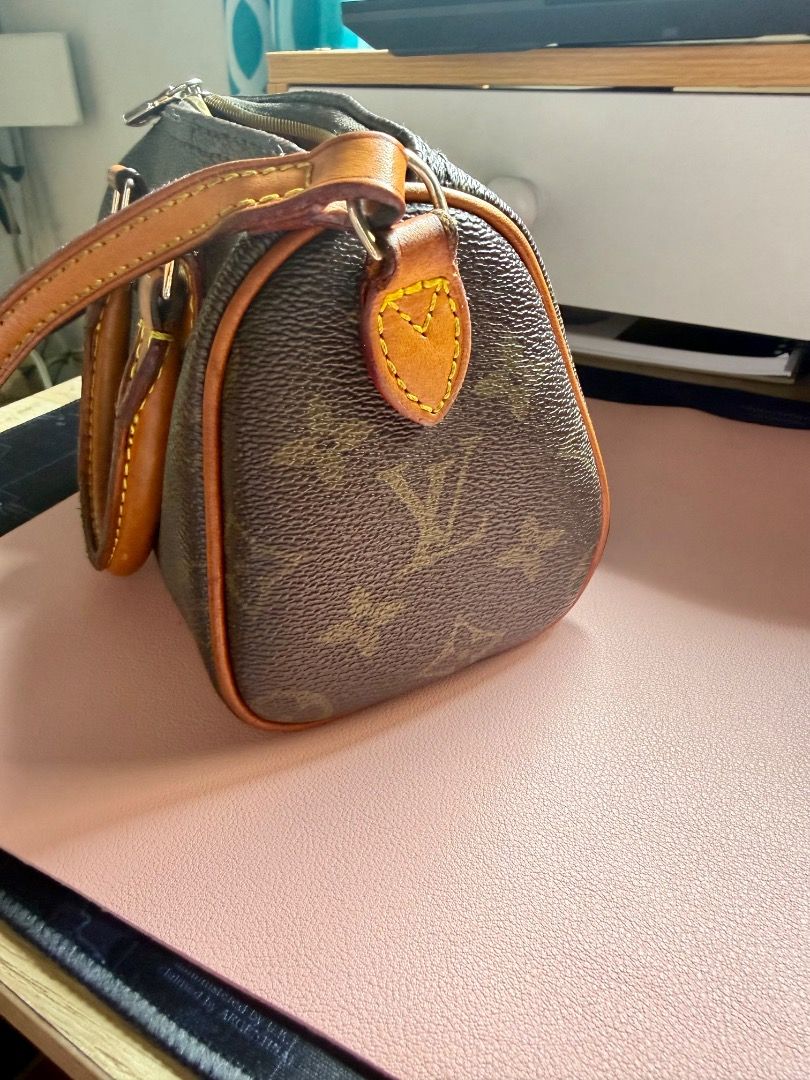 LV Speedy Nano 🤎 (Category: Luxury Bags & Wallets) located in Paniqui. Submitted by kinz.0 (Listing ID 1459939135, Image 3). Description: LV Speedy Nano👜 -Tiny but has big personality -Can be paired with many outfitssssss -Cute but can surprisingly fit many things -Not brand new -Usual wear and tear -Coded but not guaranteed .