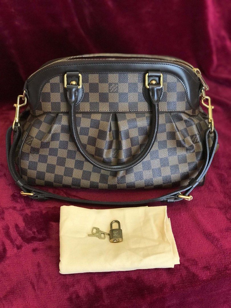 LV TREVI MM SIZE (Category: Luxury Bags & Wallets) located in Cavite. Submitted by checherosales (Listing ID 1460060435, Image 1). Description: In very good condition. Complete with lockset and dust bag. Guaranteed Authentic. Money back if proven fake. Dm us for complete photos *SUPPLIER ON HAND‼️.