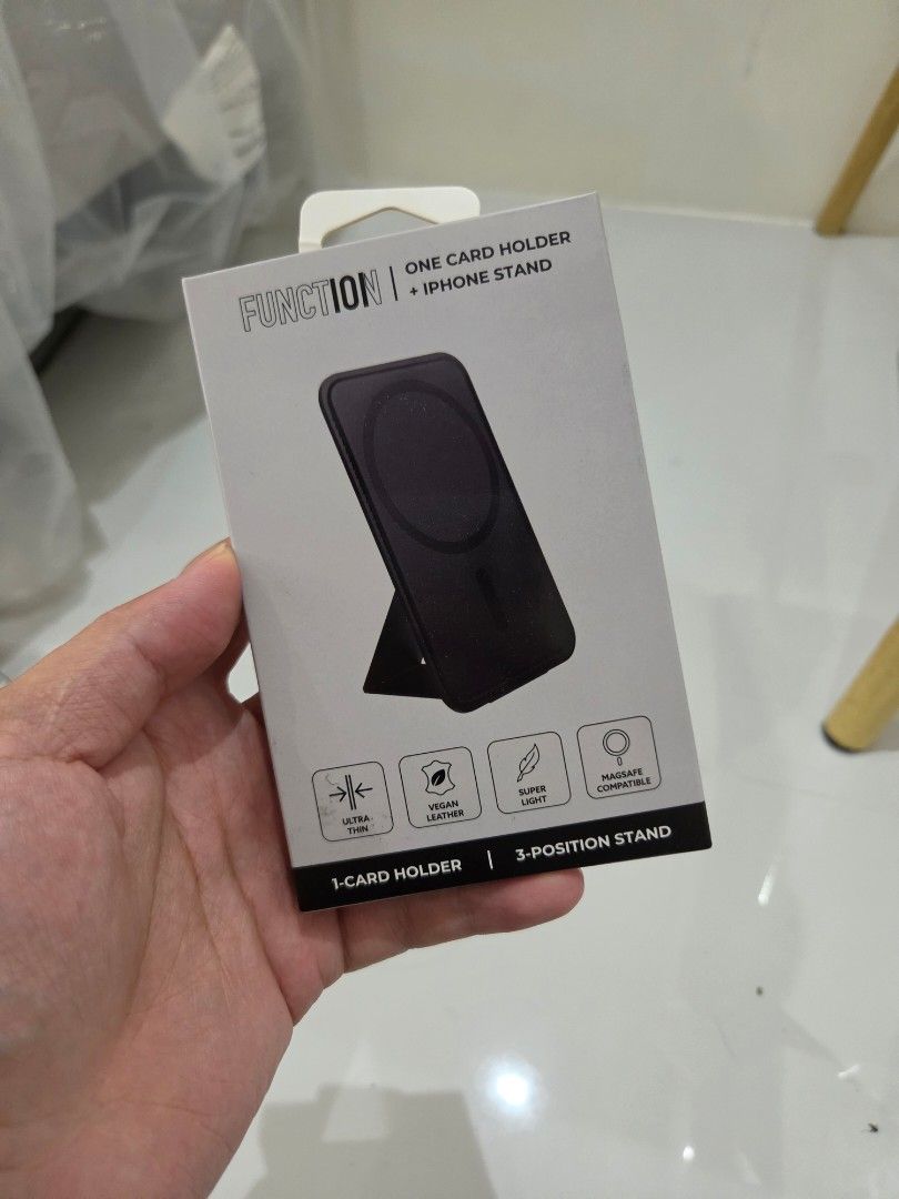 MagSafe 3-Position Stand Card Holder Wallet (Category: Other Mobile & Gadget Accessories) located in Angeles City. Submitted by technoterlex (Listing ID 1459906086, Image 1). Description: - MagSafe 3-in-1 accessory: Stand + Card Holder - Strong magnetic attachment for your iPhone - Convenient slot for 1 card - Ultra-thin and super lightweight design - Multifunctional and essential for your phone.