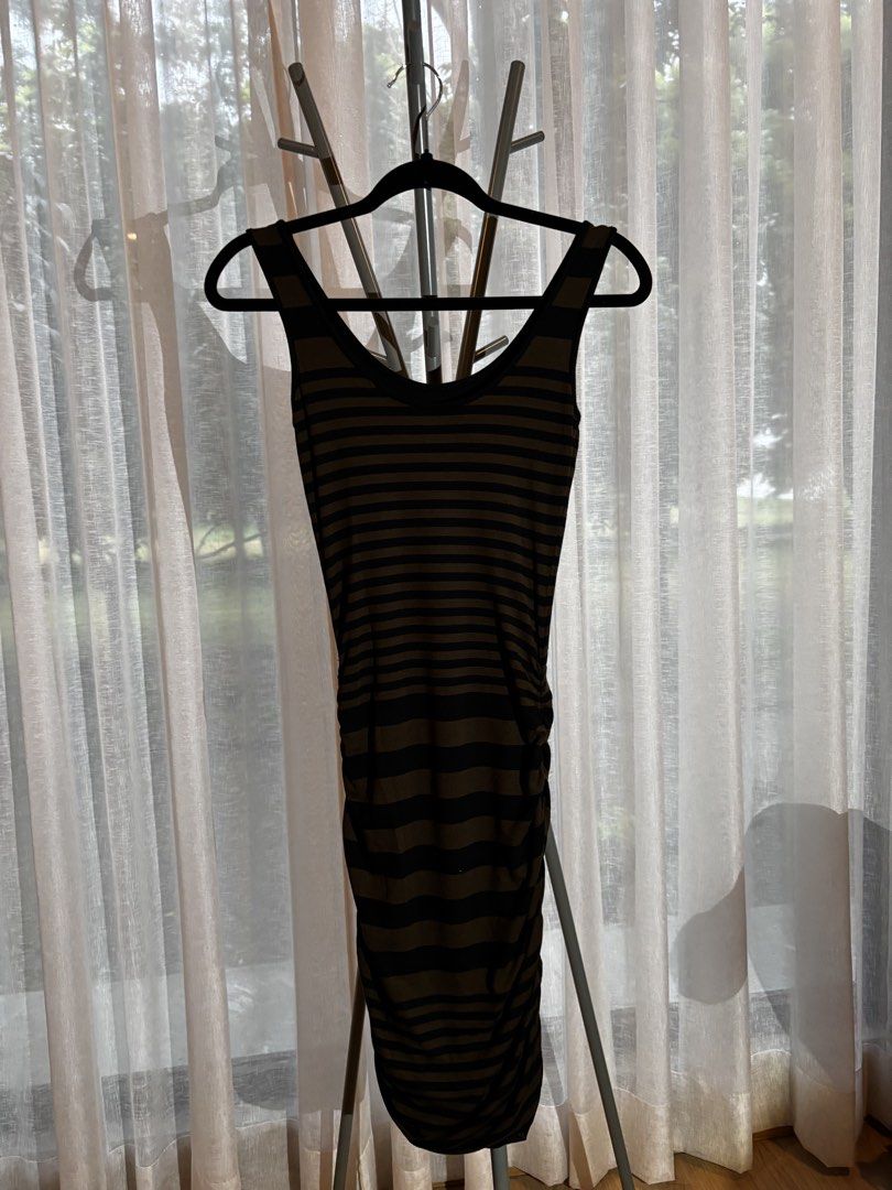 Mango Bodycon Dress XS (Category: Dresses) located in Cabuyao City. Submitted by thriftedwonders18 (Listing ID 1460010684, Image 1). Description: - Olive green and black striped tank dress - Ruched detailing on the side - Scoop neckline - Stretchy material for a comfortable fit - Ideal for casual wear.
