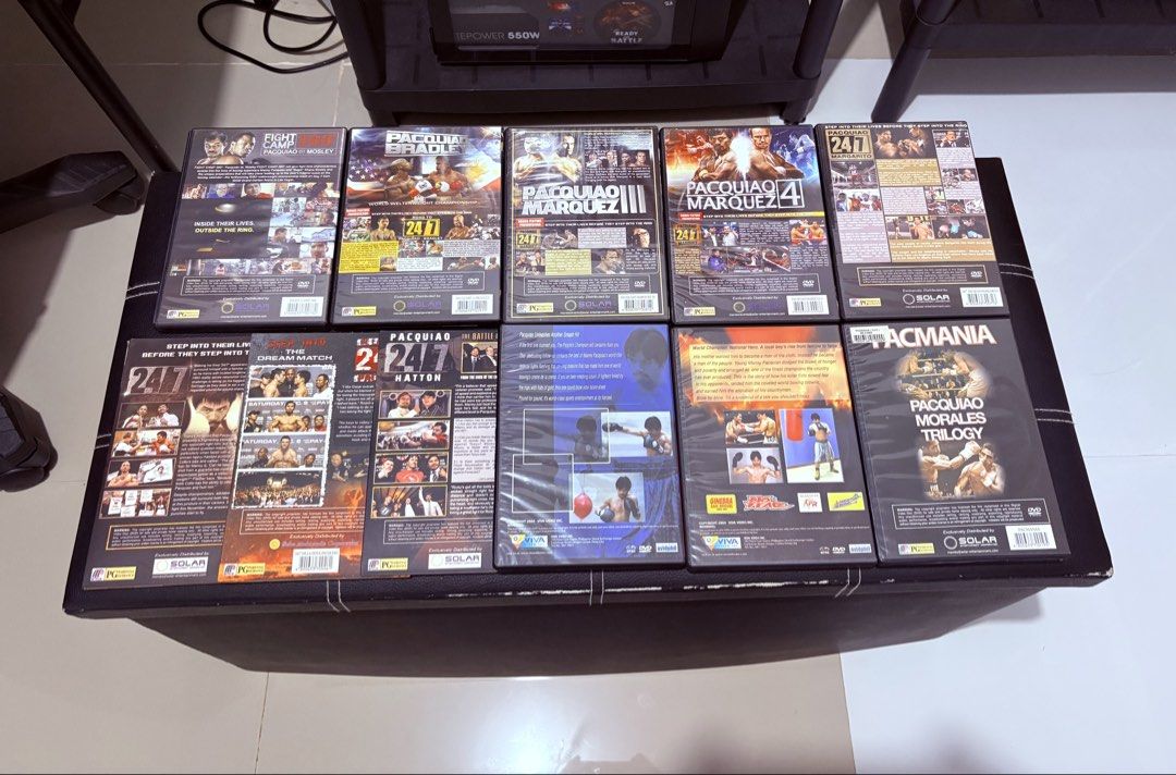 Manny Pacquiao Boxing DVD Collection (Category: CDs & DVDs) located in Manila. Submitted by wildtree_7d6348 (Listing ID 1460008838, Image 2). Description: - Collection of Manny Pacquiao boxing match DVDs. - Features fights against Bradley, Marquez, Cotto, and De La Hoya. - Includes 'Pacquiao 24/7' series and 'Pacmania'. - Ideal for any boxing enthusiast. - All discs are in their original cases..