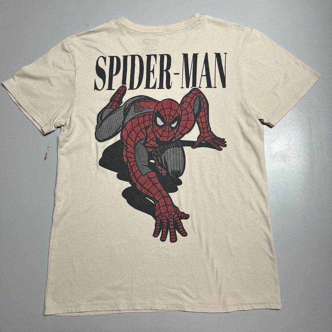 Marvel Spider-Man Graphic T-Shirt Size M (Category: Tshirts & Polo Shirts ) located in Bacolod City. Submitted by sagutgulaman (Listing ID 1459988134, Image 1). Description: - Authentic Marvel Spider-Man T-Shirt - Size: Medium - Material: Cotton-Polyester Blend - Design: Large graphic on back, smaller graphic on front .
