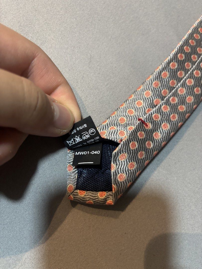 MCM firm silk polka dot necktie (Category: Ties) located in Manila. Submitted by maxxxxxxxxxxxx (Listing ID 1459921761, Image 3). Description: For sale Authentic MCM Necktie POLKA dot pattern Unique grey and orange colour Silk material super nice but firm .