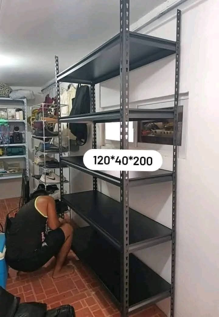 Metal rack (Category: Shelves, Cabinets & Racks) located in Manila. Submitted by nixdcruz (Listing ID 1460046915, Image 2). Description: Metal rack layer black aand white available.