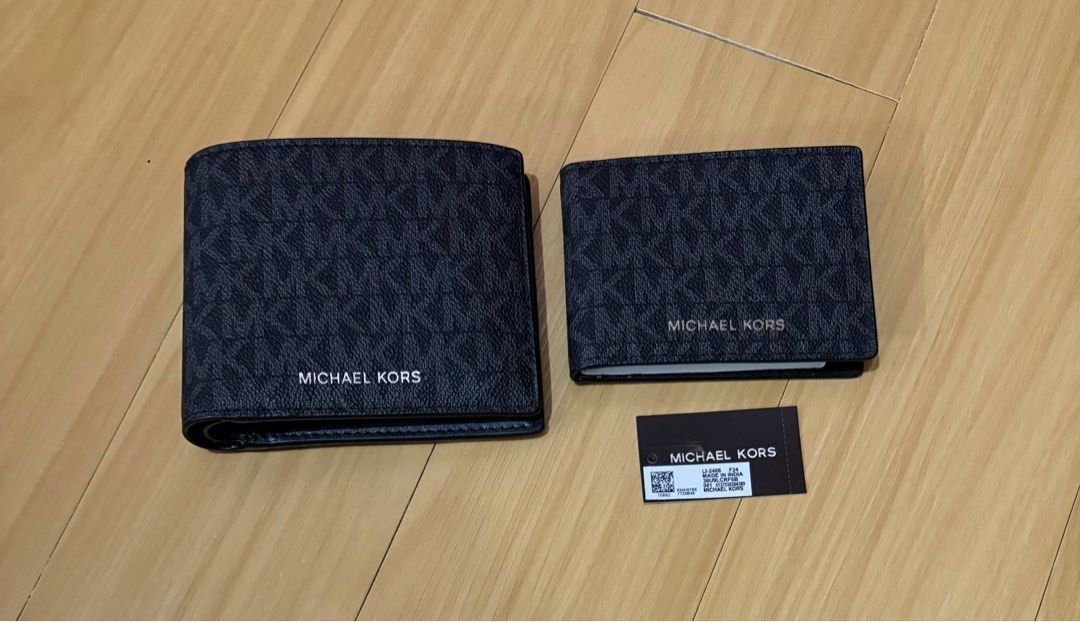 Michael Kors Men's Mono Black Wallet with Insert (Category: Wallets & Card Holders) located in Quezon City. Submitted by beckyshop2024 (Listing ID 1460103304, Image 1). Description: - Brand new with tag - Original from US - With detachable card holder.