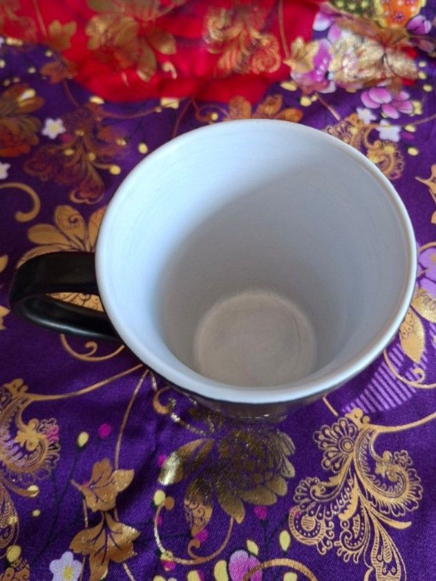 Mickey Mouse Black Mug (Category: Coffee & Tea Tableware) located in Consolacion. Submitted by luxekerei (Listing ID 1456784325, Image 3). Description: - a Disney Parks Mickey Mouse black silhouette ceramic coffee mug featuring a white sketched profile graphic of Mickey Mouse..