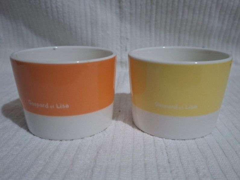 Mini cups featuring Lisa and Gaspard Ice Cream Cup (Category: Coffee & Tea Tableware) located in Consolacion. Submitted by luxekerei (Listing ID 1458229244, Image 3). Description: - a pair of promotional ceramic mini cups featuring the characters Gaspard and Lisa (from the Gaspard and Lisa picture books) released via a Pasco sweepstakes campaign around 2008..