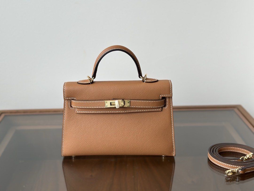 Mini kelly 19cm Gold on Gold (Category: Announcements) located in Pasig City. Submitted by wmsbags_2 (Listing ID 1459978553, Image 1). Description: Available ‼️ ✅Machine Stitch ✅Fine stamp & Code ✅Epsom Leather ✅Complete Inclusion with Box .