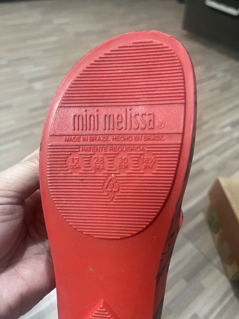 Mini Melissa Red Mickey Mouse Jelly Flats (Category: Babies & Kids Fashion) located in Makati City. Submitted by eunice_tr (Listing ID 1459935458, Image 2). Description: - Adorable red jelly flats from Mini Melissa. - Features a fun all-over Mickey Mouse print. - Secure strap with buckle closure. - Proudly made in Brazil. - Ideal for little Disney enthusiasts. Original Size: US12 / EUR30.