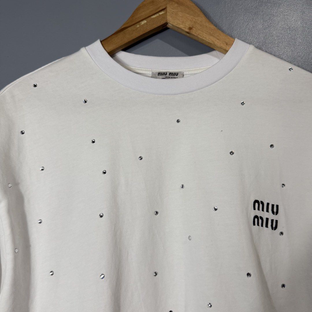 MIU MIU (Category: Blouses) located in Mangaldan. Submitted by restyletrends.ph (Listing ID 1460076860, Image 2). Description: MIU MIU Size : Medium to Large Length : 19 Width : 20 Color rate : 10/10 Like new No issue.
