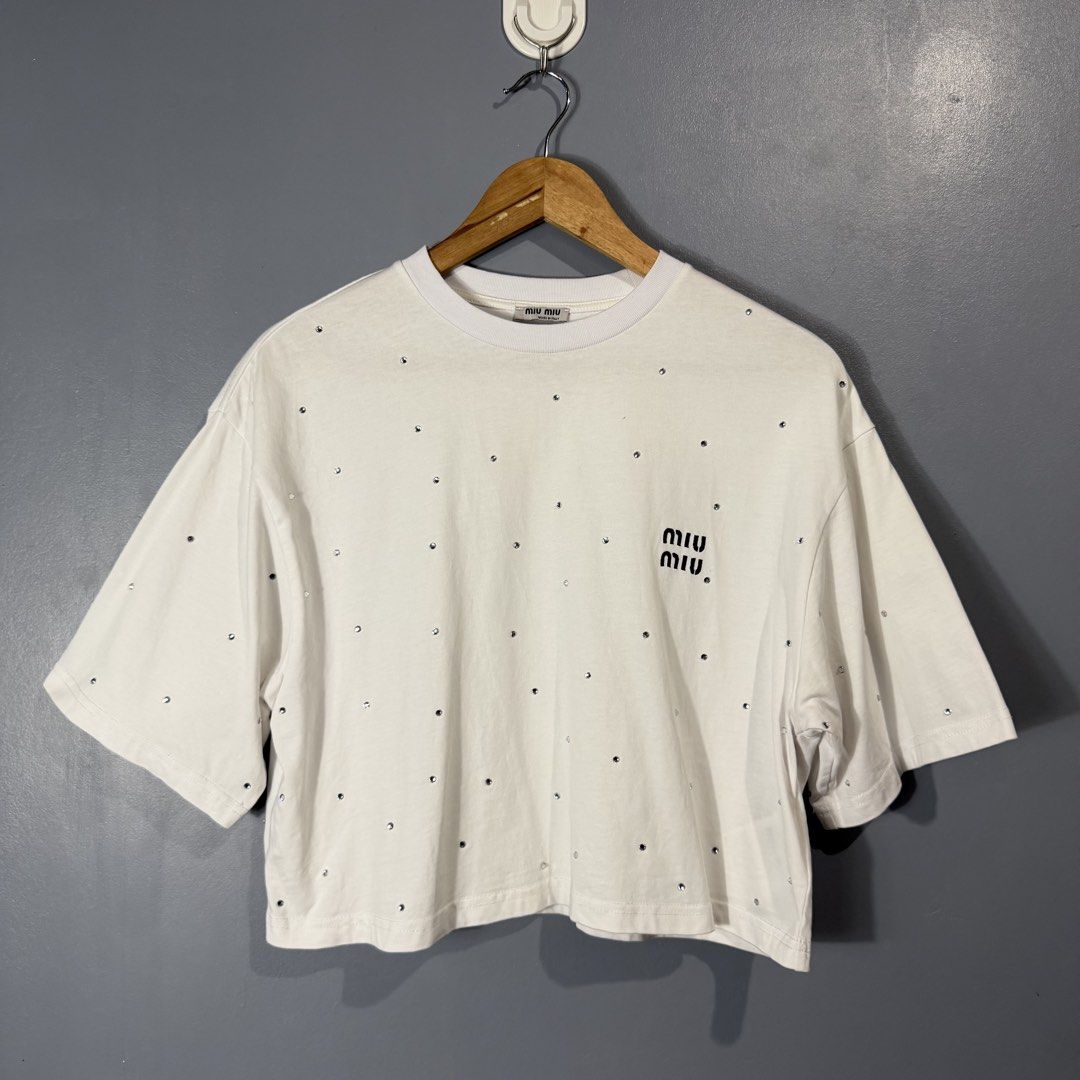 MIU MIU (Category: Blouses) located in Mangaldan. Submitted by restyletrends.ph (Listing ID 1460076860, Image 1). Description: MIU MIU Size : Medium to Large Length : 19 Width : 20 Color rate : 10/10 Like new No issue.