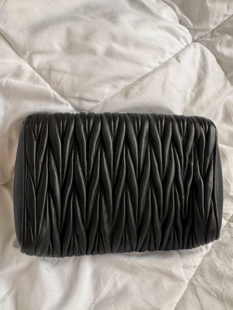 Authentic Miu Miu Black Matelassé with COA (Category: Luxury Bags & Wallets) located in Angeles City. Submitted by thala.1204.68 (Listing ID 1460052042, Image 3). Description: - Authentic Miu Miu Matelasse with B101 Revue certificate for authenticity/100% original - Signature matelassé leather - Detachable strap included - Elegant gold hardware .