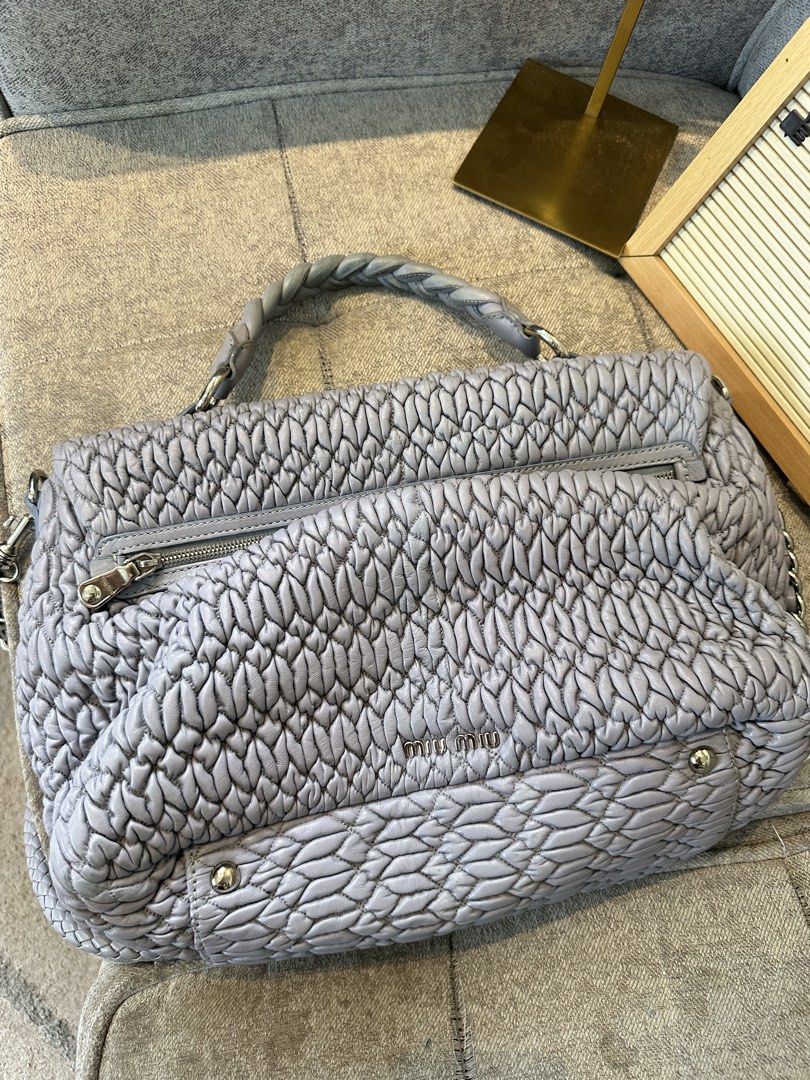 Miu Miu Matelasse Top handle bag Large Size (Category: Luxury Bags & Wallets) located in Los Banos. Submitted by joshua_morales (Listing ID 1460076934, Image 2). Description: Miu Miu Too Handle bag/Sling Bag/Shoulder Bag Excellent Condition. Please see pictures provided. Message me if interested. .