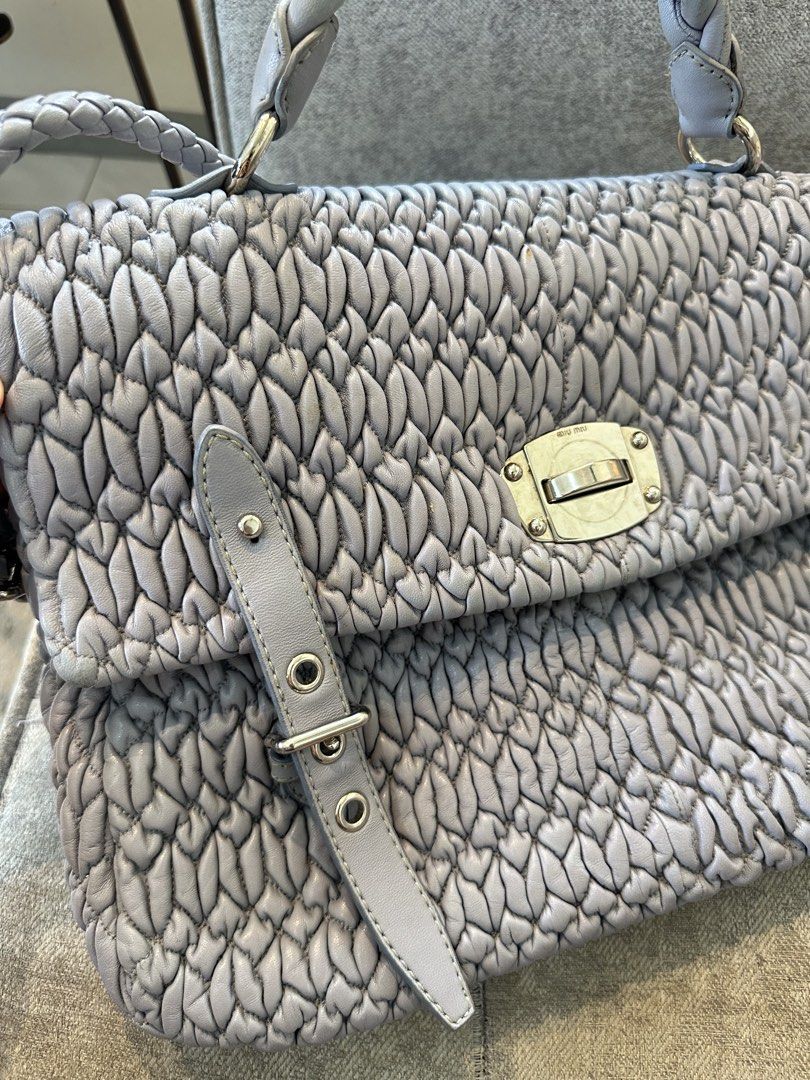Miu Miu Matelasse Top handle bag Large Size (Category: Luxury Bags & Wallets) located in Los Banos. Submitted by joshua_morales (Listing ID 1460076934, Image 3). Description: Miu Miu Too Handle bag/Sling Bag/Shoulder Bag Excellent Condition. Please see pictures provided. Message me if interested. .
