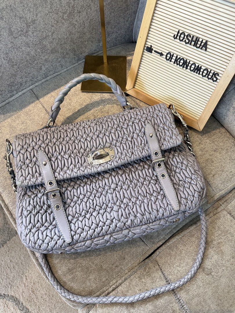 Miu Miu Matelasse Top handle bag Large Size (Category: Luxury Bags & Wallets) located in Los Banos. Submitted by joshua_morales (Listing ID 1460076934, Image 1). Description: Miu Miu Too Handle bag/Sling Bag/Shoulder Bag Excellent Condition. Please see pictures provided. Message me if interested. .