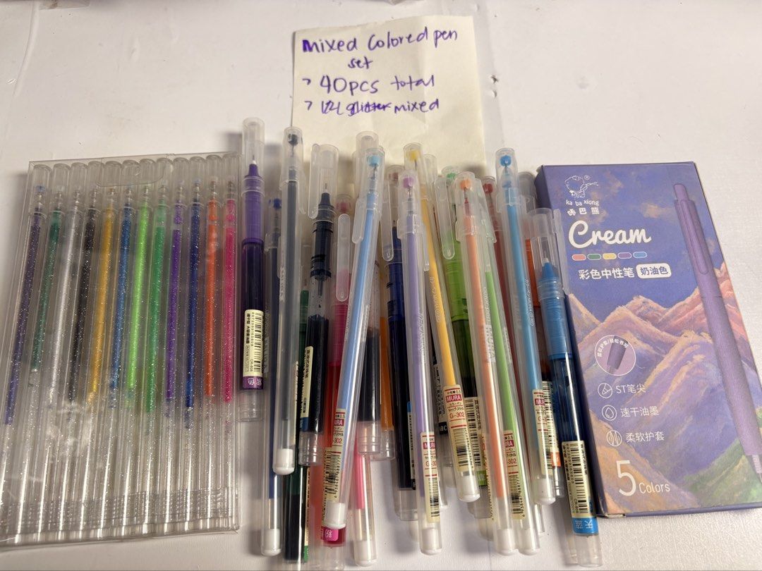 Mixed Colored Glitter Gel Pens Set - 40 pcs Total (Category: Stationery & School Supplies) located in Pasig City. Submitted by purplewingsph1 (Listing ID 1460104886, Image 1). Description: - Set of 40 mixed colored gel pens PAYO Only. Strictly no COD. (Please view my Carousell profile for proof of legitimacy: purplewingsph1) Mode of payment: Gcash, Maya, or Bank transfer (Seabank or UB) Mode of Delivery: Buyer will shoulder shipping. Can do Same-