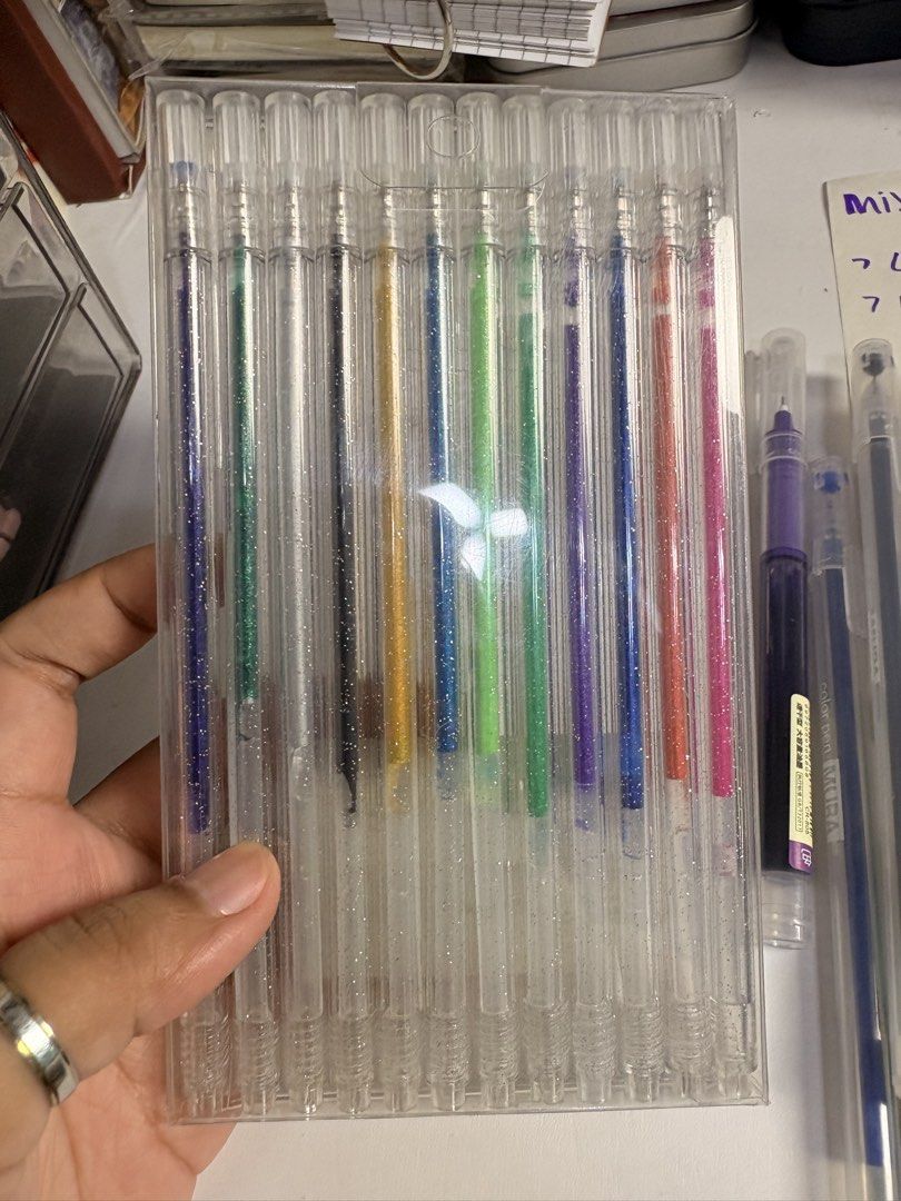 Mixed Colored Glitter Gel Pens Set - 40 pcs Total (Category: Stationery & School Supplies) located in Pasig City. Submitted by purplewingsph1 (Listing ID 1460104886, Image 2). Description: - Set of 40 mixed colored gel pens PAYO Only. Strictly no COD. (Please view my Carousell profile for proof of legitimacy: purplewingsph1) Mode of payment: Gcash, Maya, or Bank transfer (Seabank or UB) Mode of Delivery: Buyer will shoulder shipping. Can do Same-