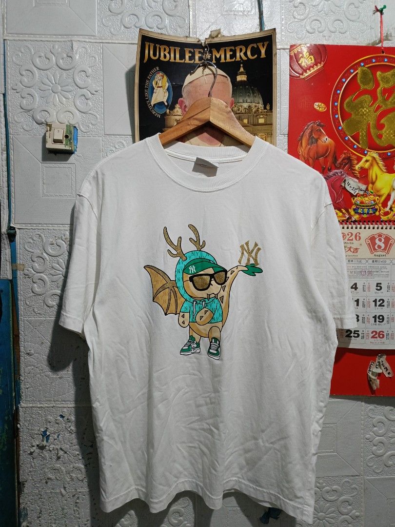 MLB Yankees Dragon design (Category: Tshirts & Polo Shirts ) located in Quezon City. Submitted by charlesfab66127 (Listing ID 1460085495, Image 1). Description: Available available!! MLB Yankees Dragon design 🤑 Size on tag: Medium 👕 Dimes: - 21.5 Width - 27 Length Color rate: 9.5/10 Condition: 9.5/10 Issue: dot yellow stain📌 Loc. Batasan Hills Quezon City 📩📩📩.