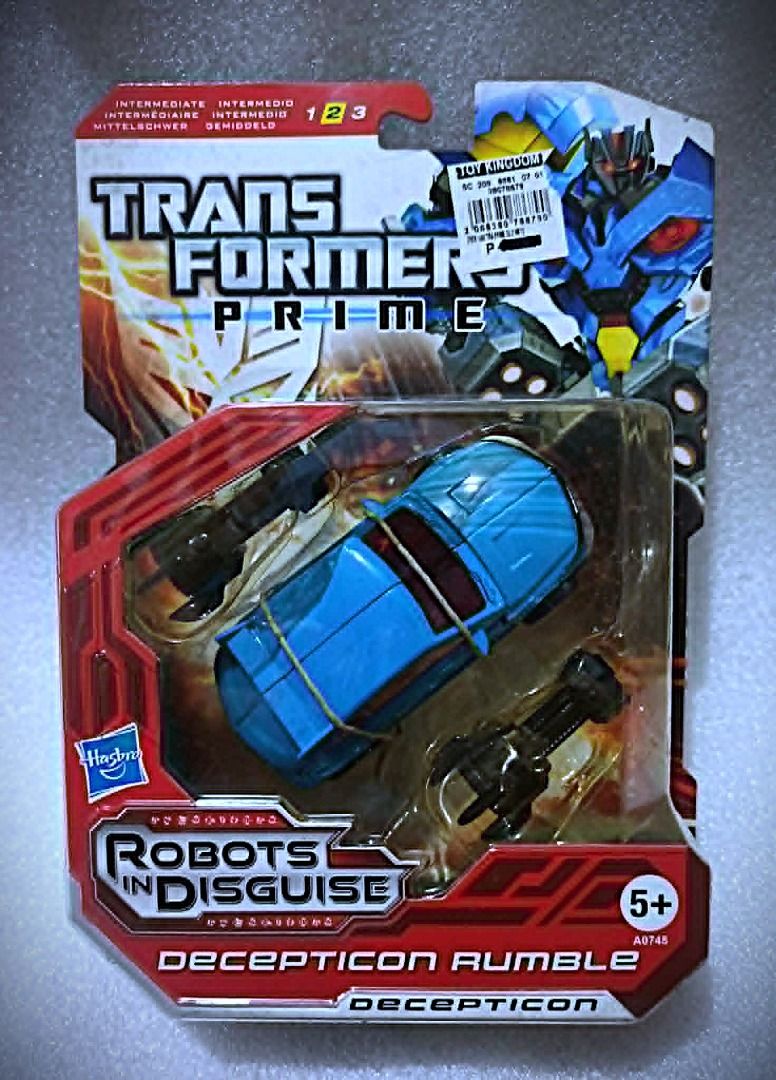 MOC TF Prime RUMBLE Hasbro Deluxe Class Decepticon Transformers (Category: Action & Battle Toys) located in Pasay City. Submitted by Chariselyn (Listing ID 1459987367, Image 1). Description: MOC TF Prime RUMBLE (1,300+sf) Hasbro Deluxe Class Decepticon Transformers Series: Robots in Disguise, 2009 Scale: 6 inches Stock: 1 Card Condition: 10/10 Issues: 0 Accessories: complete Mode of Payment: GCash or through your rider Shipping options: Payment f