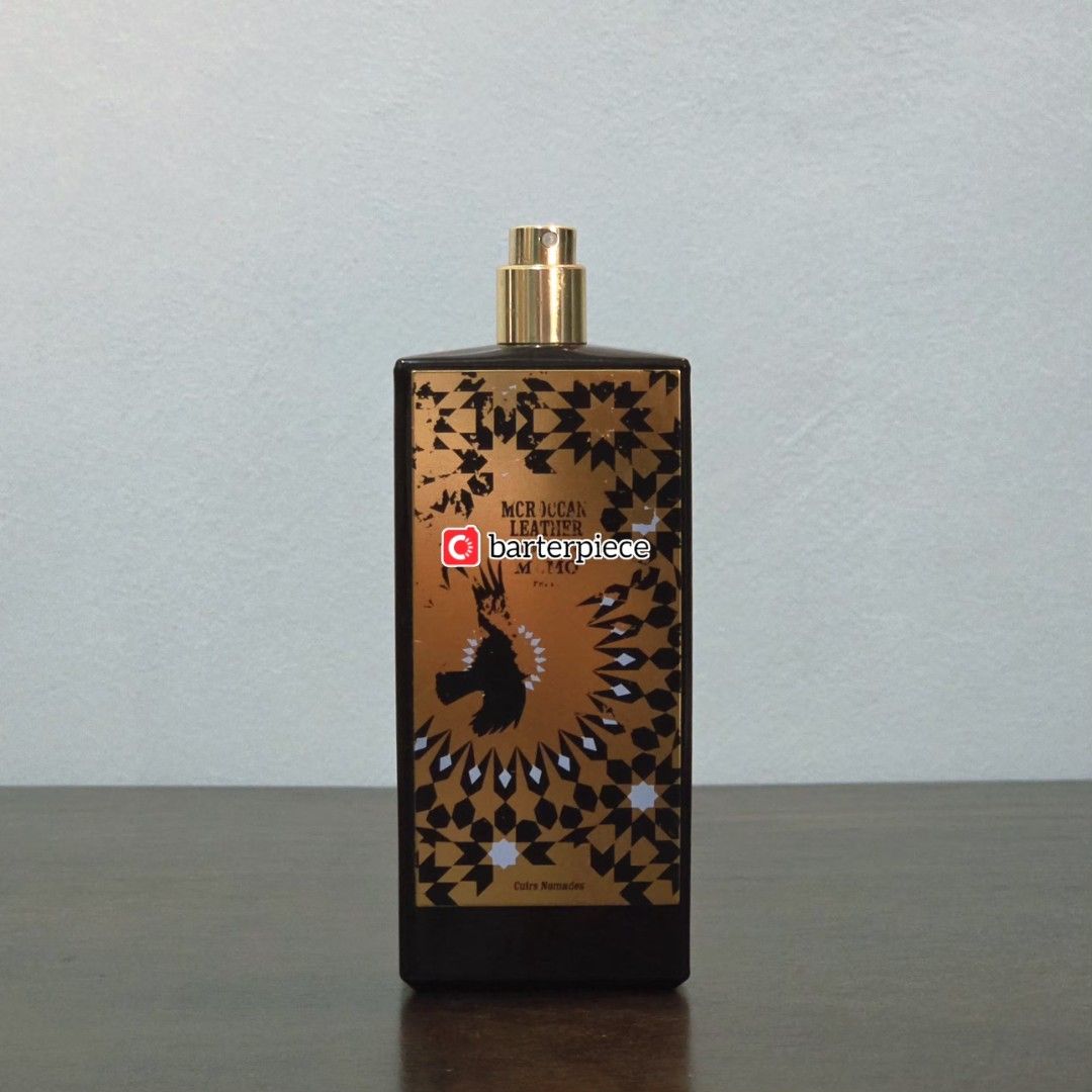 Moroccan Leather by Memo Paris (Eau de Parfum) (Category: Fragrance & Deodorants) located in Quezon City. Submitted by barterpiece (Listing ID 1460090244, Image 1). Description: Memo Paris Moroccan Leather EDP — 75 mL • Batch code: 28068 (2018) • ~55-60 mL remaining / 75 mL (see juice level) • Bottle only; no cap • Some of the printed details have faded (see photos). I also intentionally scraped a small corner of the bottle to make the juice leve