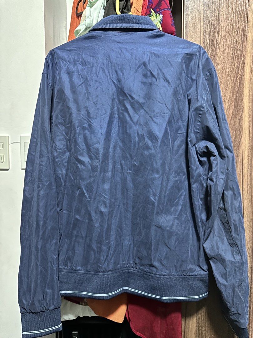 M&S Collection Navy Regular Fit Bomber Jacket (Category: Coats, Jackets and Outerwear) located in Cavite. Submitted by yong_mountaineering (Listing ID 1460044213, Image 3). Description: - Navy blue bomber jacket from M&S Collection - Regular fit - Zip-up front with two zip pockets - Lined with classic plaid pattern - Ribbed collar, cuffs, and hem - Ideal for casual wear.