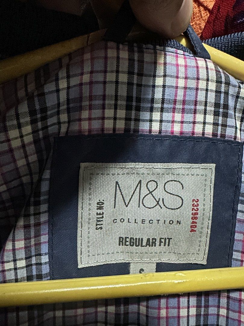 M&S Collection Navy Regular Fit Bomber Jacket (Category: Coats, Jackets and Outerwear) located in Cavite. Submitted by yong_mountaineering (Listing ID 1460044213, Image 2). Description: - Navy blue bomber jacket from M&S Collection - Regular fit - Zip-up front with two zip pockets - Lined with classic plaid pattern - Ribbed collar, cuffs, and hem - Ideal for casual wear.