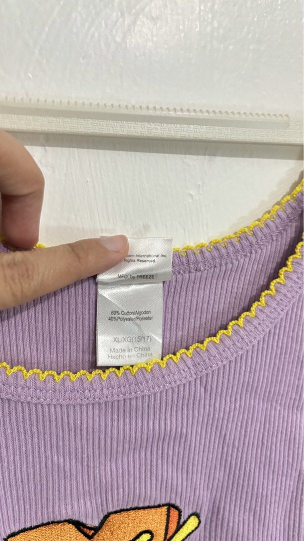 MTV Graphic Ribbed Crop Tank Top (Category: Sleeveless) located in Caloocan City. Submitted by buymethisandthat (Listing ID 1460029128, Image 3). Description: ✨ MTV Graphic Ribbed Crop Tank Top with Yellow Trim - ₱149 📌 CONDITION • Condition: 9/10 • Flaws: None visible 📏 SIZE • Tag Size: XL • Recommended: Fits Medium to Large as a crop top .