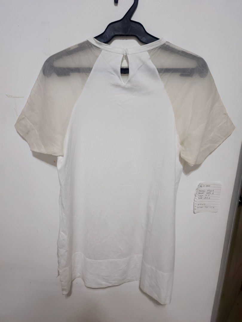 N*21 (Category: Blouses) located in Dasmarinas. Submitted by jessputrages (Listing ID 1459972897, Image 2). Description: For sale N*21 Excellent condition No issue Silk infront Cotton inback 550 plus shipping fee Pm for more details.