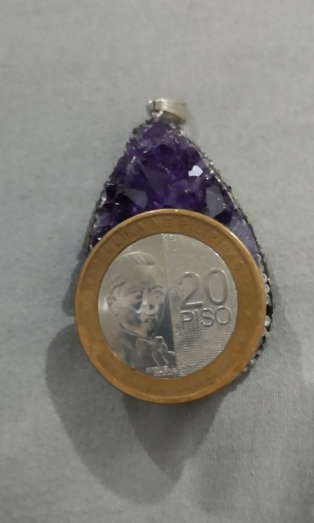 Natural Amethyst crystal pendant (Category: Luxury Accessories) located in Manila. Submitted by ztylish2018 (Listing ID 1459974397, Image 3). Description: Calming energy: People use amethyst to ease anxiety, soothe the mind, and reduce everyday stress. Better rest: Placing the stone near a bed or under a pillow is believed to help stop nightmares and improve sleep quality This Amethyst is natural you can pay tru Gcash you add 100 if you want it w