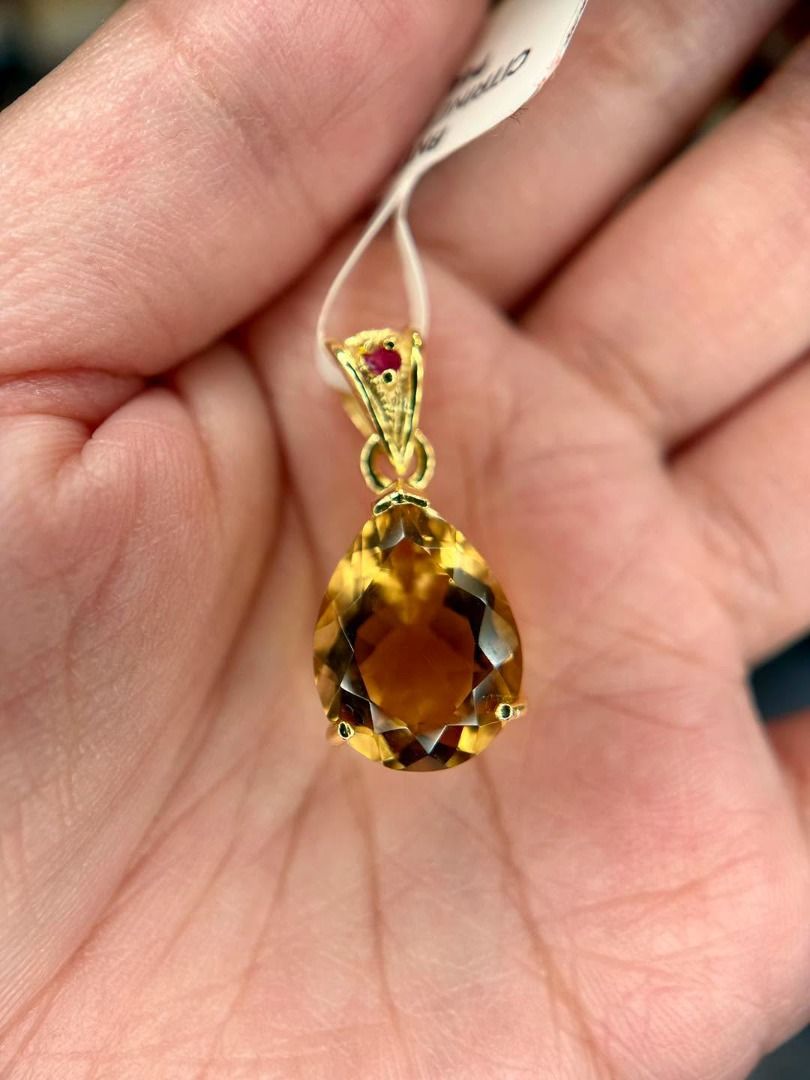 Natural Citrine & Natural Ruby Pendant (Category: Body Jewelry) located in Baguio. Submitted by asna_taku (Listing ID 1459982629, Image 3). Description: ✨ Golden glow with a touch of ruby! ❤️💛 A beautiful Natural Citrine & Ruby Pendant, newly crafted in silver plated in gold. The warm golden citrine paired with a delicate ruby accent makes this a timeless piece that adds an elegant pop of color to any look. ✨ 💎 Natural Citrine ❤️ Natural Ruby ✨