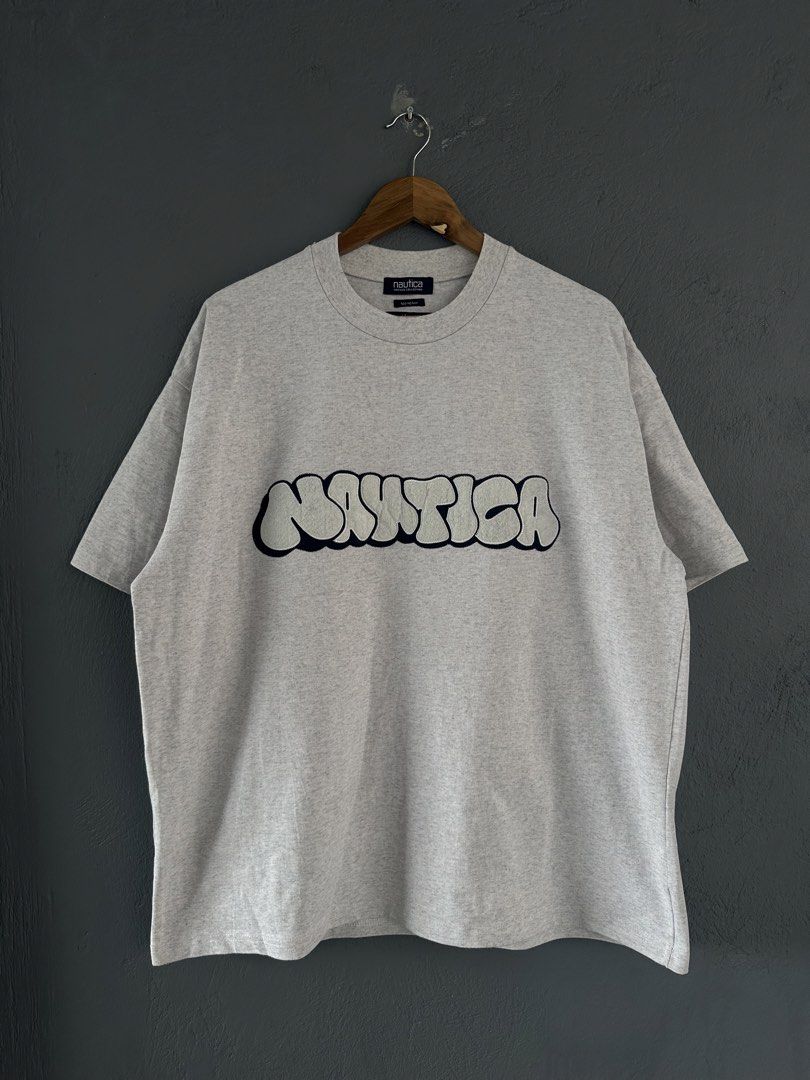 NAUTICA JAPAN x Stacks Graffiti Logo tee (Category: Tshirts & Polo Shirts ) located in Pasig City. Submitted by worn2wice (Listing ID 1459948863, Image 1). Description: Size Large Measurements (in) Width 25.5 Length 29.5 Sleeve Length 9 Issue: Ink stains on right arm Excellent condition No copyright infringement intended. This post is for resale purposes only. All trademarks, logos, and brand names belong to their respective owners. .