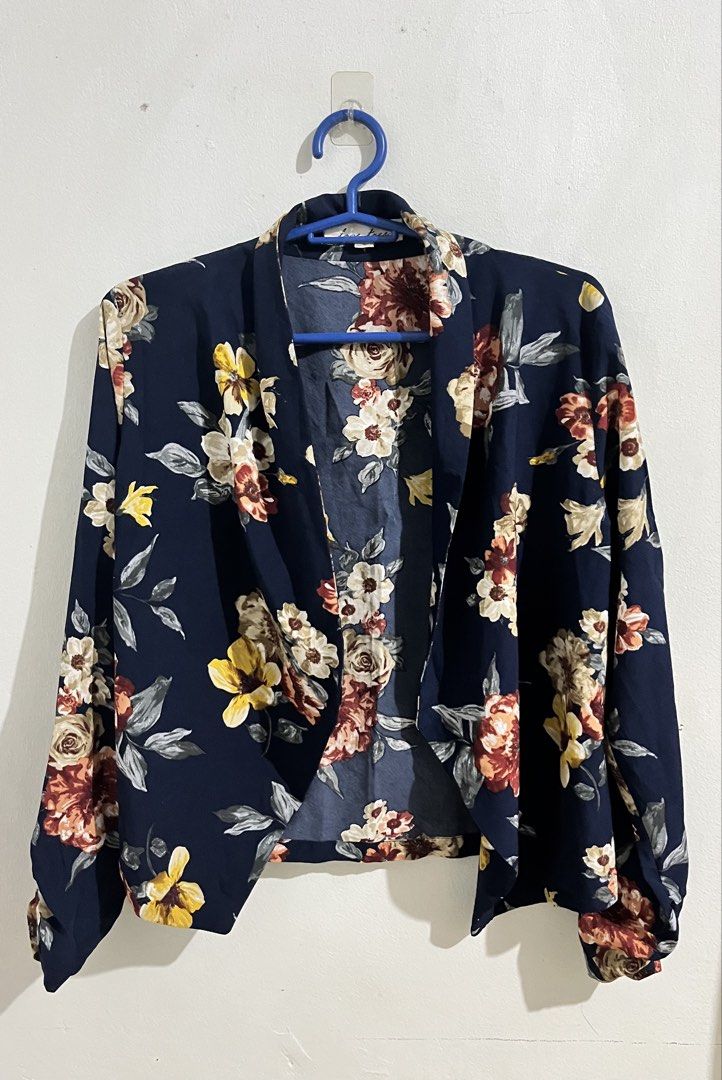 Navy Blue Floral Open Front Cardigan (Category: Coats, Jackets and Outerwear) located in Manila. Submitted by its_prldryn (Listing ID 1460096712, Image 1). Description: - Navy blue cardigan - Beautiful floral print with yellow, cream, and red flowers, and grey leaves - Open front design for easy layering - Lightweight fabric - Adds a pop of color to any outfit.