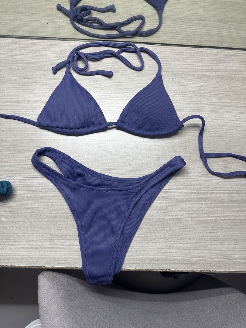 Navy Blue Ribbed Triangle Bikini Set (Category: Bikinis & Swimsuits) located in Marikina City. Submitted by kayy__closet (Listing ID 1459925972, Image 1). Description: - australian brand - fits medium but bottom can fit up to large. - really nice and uniue color - never used out. Only tried on.