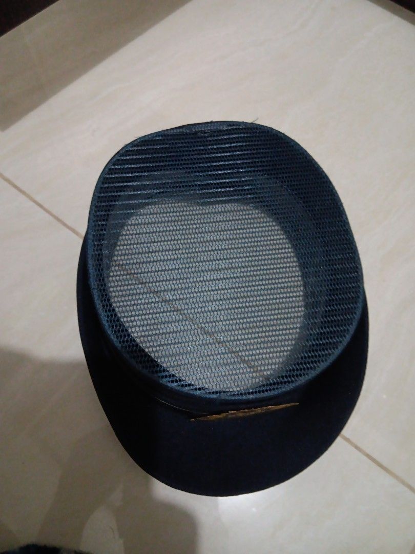 Navy Blue Security Guard Hat with Gold Emblem (Category: Caps & Hats) located in Manila. Submitted by ocyobe4man (Listing ID 1460051613, Image 2). Description: - Navy blue security guard hat - Features a gold 'SECURITY GUARD' emblem on the front - Mesh material on top for breathability and ventilation - Ideal for costumes, role-playing, or collector's items - Unique headwear piece.