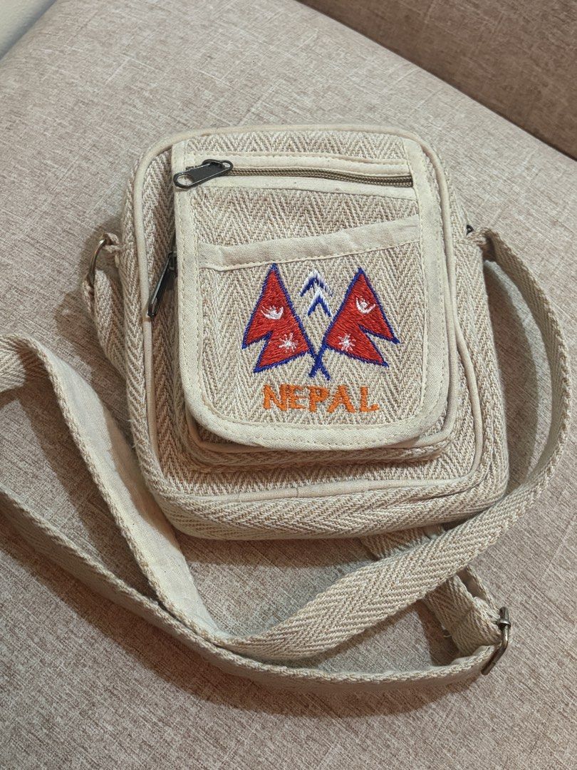nepal cross body bag (Category: Cross-body Bags) located in Manila. Submitted by thenewmen96 (Listing ID 1460068595, Image 1). Description: cross-body bag featuring an embroidered Nepali flag and the word “NEPAL” embroidered condition 9/10 need wash lang rsf : declutter .