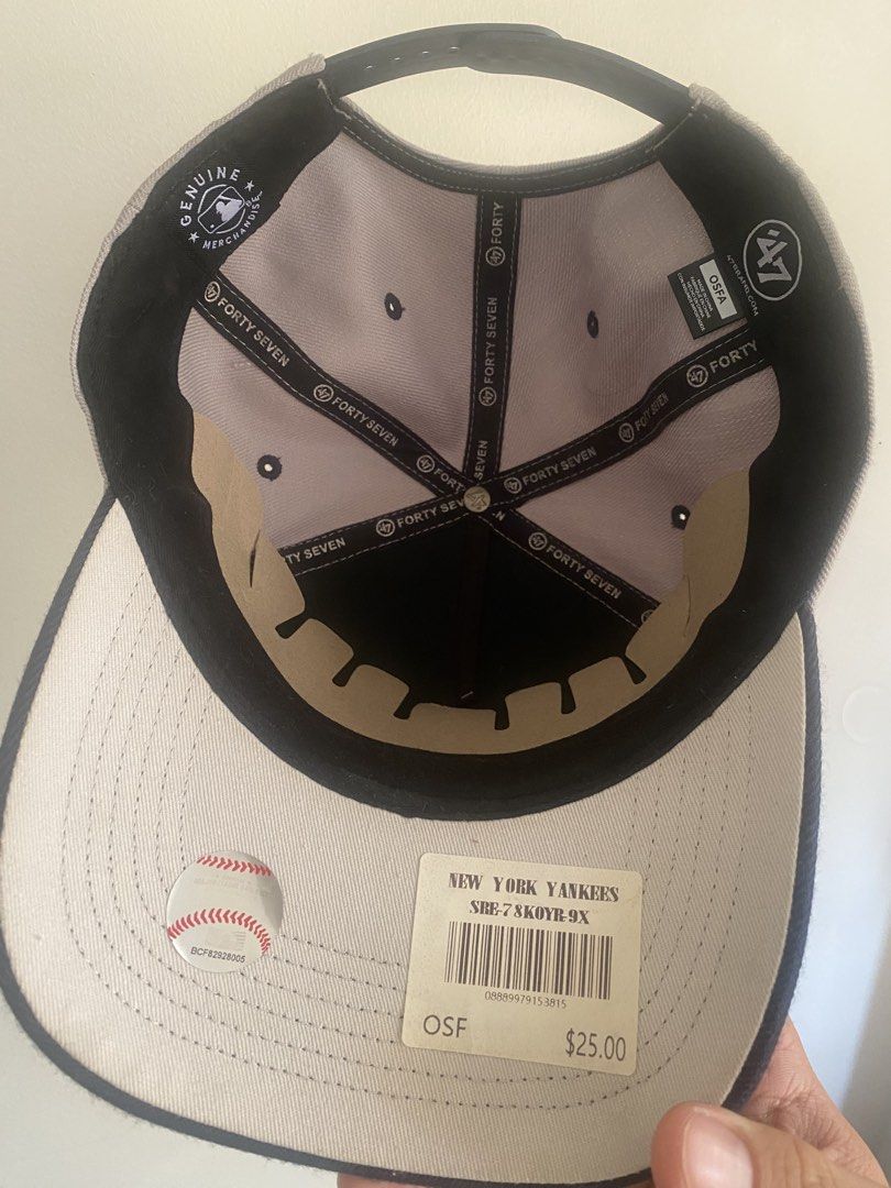 New York Yankees 47 MVP Adjustable Cap (Category: Caps & Hats) located in Manila. Submitted by madisonj (Listing ID 1460103290, Image 3). Description: - Grey and navy New York Yankees cap - Features iconic Yankees logo and 'New York Yankees' text - Adjustable back for a comfortable, custom fit - Made by reputable brand 47 Brand - A must-have for any dedicated Yankees fan!.