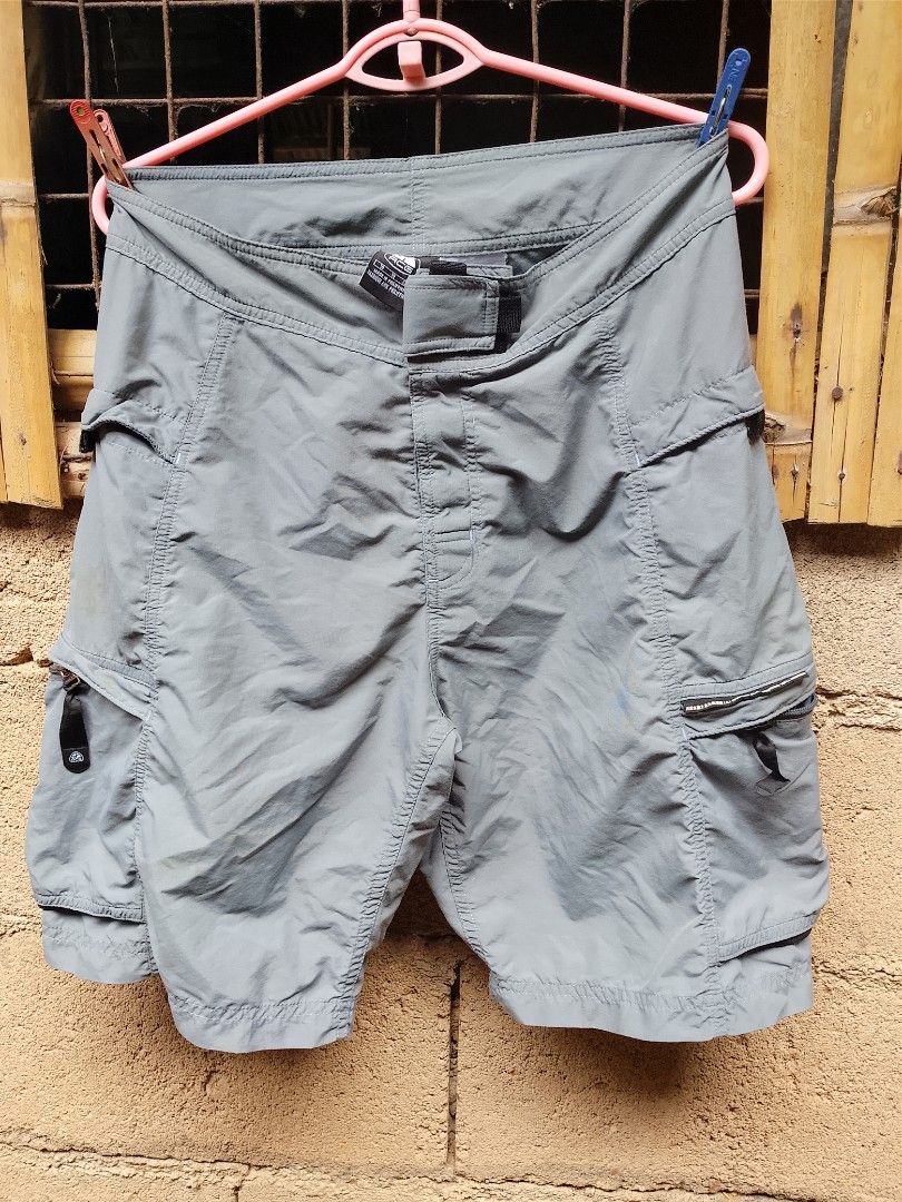 Nike ACG Cargo Shorts Size 30 (Category: Shorts) located in Manila. Submitted by uniqthrift30 (Listing ID 1459905754, Image 1). Description: - Grey Nike ACG Cargo Shorts - Waist 31-32 - Lenght 20 - Size 30 - Made in the Philippines - Multiple zip pockets with velcro closures - Ideal for outdoor adventures or everyday casual wear - Durable and long-lasting material.