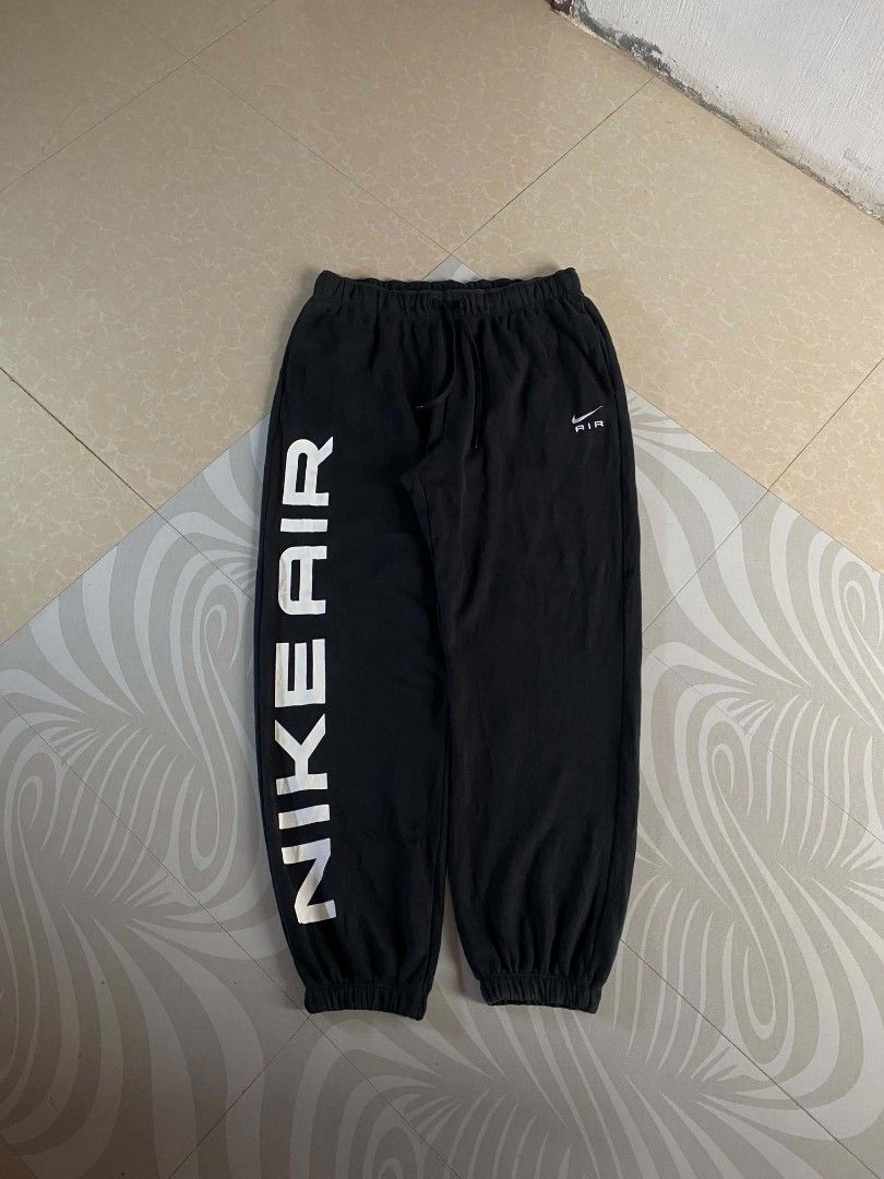 Nike Air Black Sweatpants Joggers (Category: Joggers) located in Angeles City. Submitted by dathrifthaven (Listing ID 1460079822, Image 3). Description: Nike Air Spellout Pants Authentic / Original XL on tag Excellent condition Overall 9.5/10 Not fade Color may vary due to lighting condition Dimes: Waist: 31-42 (w/ lace) Length: 40 Thigh: 14 Leg opening: 5.5.