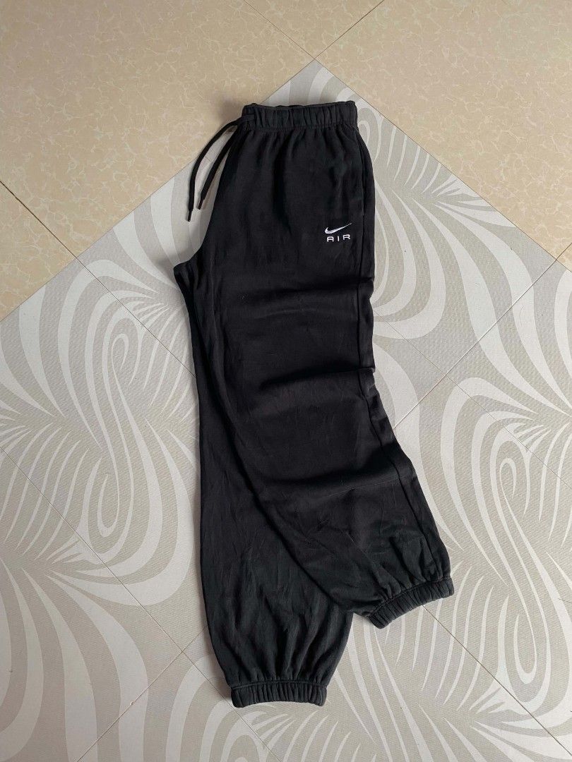 Nike Air Black Sweatpants Joggers (Category: Joggers) located in Angeles City. Submitted by dathrifthaven (Listing ID 1460079822, Image 1). Description: Nike Air Spellout Pants Authentic / Original XL on tag Excellent condition Overall 9.5/10 Not fade Color may vary due to lighting condition Dimes: Waist: 31-42 (w/ lace) Length: 40 Thigh: 14 Leg opening: 5.5.