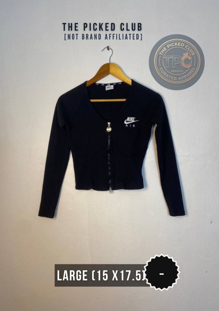 Nike Air Zip-Up Jacket (Category: Coats, Jackets and Outerwear) located in Imus. Submitted by thepickedclub (Listing ID 1459999084, Image 1). Description: large (15 x17.5) - Black Nike Air zip-up jacket - Long sleeves with a fitted waist - Features the iconic Nike Air logo on the chest - Unique zipper charm with a smiley face - Size: Large.
