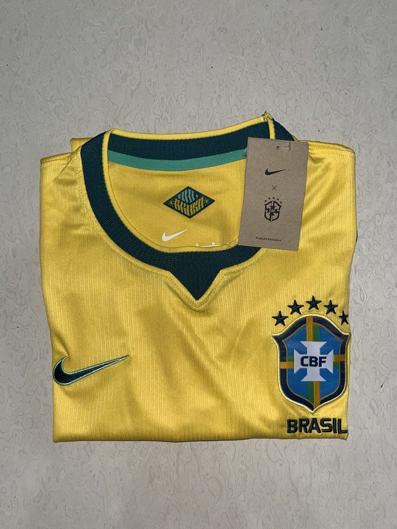 Nike Brazil CBF Soccer Jersey (Category: Tshirts & Polo Shirts ) located in Manila. Submitted by j.clo_dvo (Listing ID 1460040453, Image 1). Description: - Authentic Nike Brazil National Team Soccer Jersey - Vibrant Yellow Color - Features official CBF crest and 'Brasil' text - Special graphic detail on the collar - Brand new with original tags attached - Size: Medium (M).