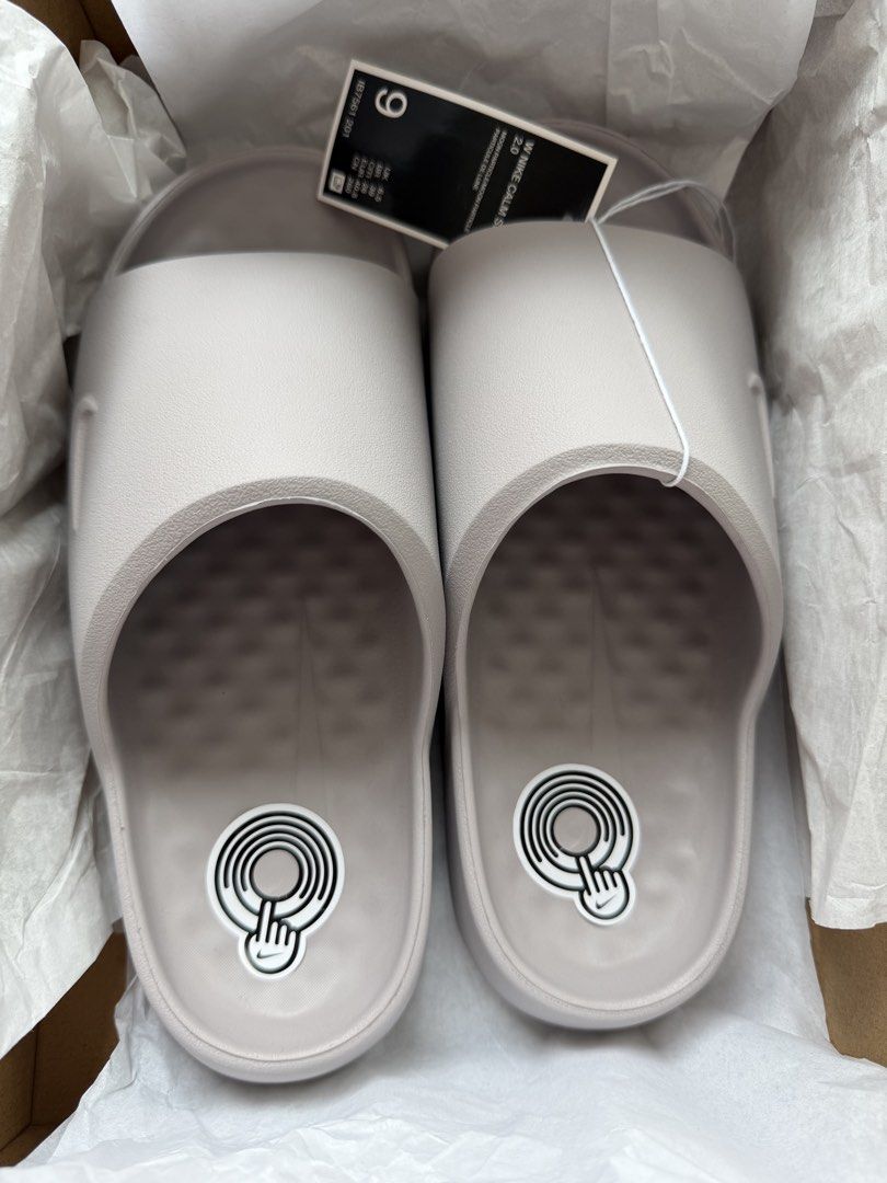 Nike Calm 2.0 Slides (Category: Slippers and slides) located in Makati City. Submitted by chachachimm (Listing ID 1459974324, Image 3). Description: FOR SALE Nike Calm Slides Calm 2.0 Brand New / Never Used Price: ₱2,500 Color: Moon Particle Women’s US Size 9 Fits: 25.5 cm (with allowance) up to 27 cm Suitable for wide feet & flat feet Also available in Men’s Size 7 / Women’s Size 8 Reason for selling: Wrong size MOP: GCash or Bank Transfer 📩 PM