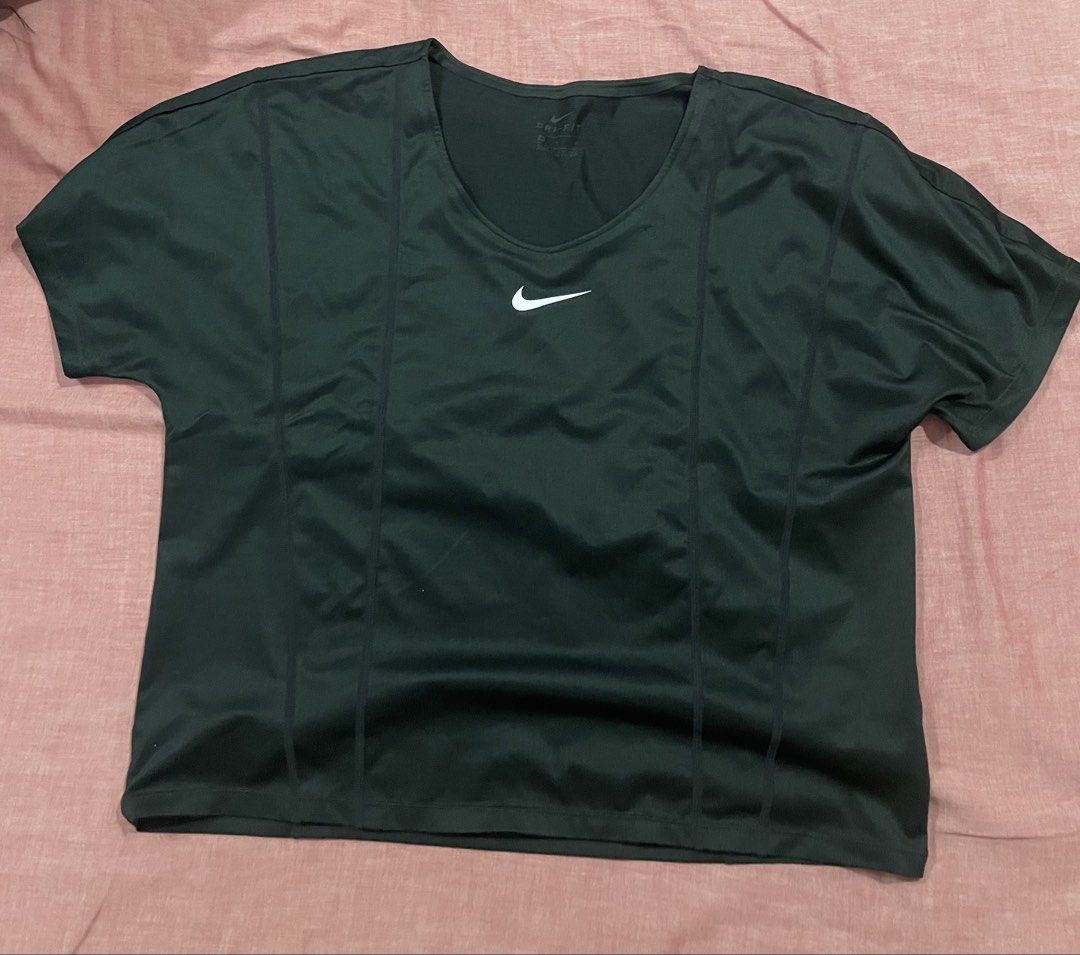 Nike Dri-Fit T-Shirt Size M (Category: Tshirts & Polo Shirts ) located in Bacoor. Submitted by yournewfavorite (Listing ID 1459968107, Image 1). Description: - Black Nike Dri-Fit T-shirt - Size: Medium (M) - Approximate Measurements: 18" width, 19.5" length - Ideal for workouts or casual wear - Made in Vietnam.